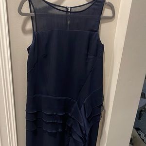 Super cute navy dress! Sheer top above the chest line.